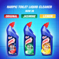 (Mug Free) Harpic Toilet Cleaner Liquid 750ml Lemon Power Plus 10x Total Clean, new & thicker formula kills 99.99% of germs with new Lemon Fragrance. 