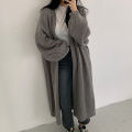Korean version lazy wind pit strip long sweater women's coat 2023 new solid color loose balloon sleeve knitted cardigan tide. 