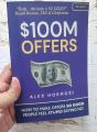 $100M Offers: How To Make Offers So Good People Feel Stupid Saying No by Alex Hormozi - Premium - Paperback.