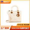 One piece dropshipping wholesale daifei bag women's 2024 fashion lady hand-held women's bag diagonal across niche embroidery thread bright leather bag. 