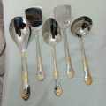 4 pcs set or any 1 pcs that you order ,stainless steel big spoon set Rice spoon,logn rice spoon,sup spoon, spatula spoon golden design heavy quality. 