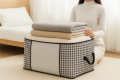 • Large Capacity Clothes Storage Bag with Zipper & Handles – Foldable Blanket & Quilt Organizer Box.