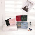 Vintage embroidery lipstick envelope small portable velvet cosmetic bag aunt towel sanitary napkin storage bag manufacturer wholesale. 