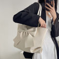 Bow large capacity tote bag women's 2022 new niche luxury soft-faced commuter handbag shoulder bag. 