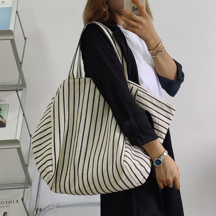 Canvas%20bag%20women's%20ins%20one-shoulder,%20large-capacity,%20lazy%20wind,%20striped%20fashion,%20big%20bag,%20casual%20literary%20hand-tote%20bag%20women%20-%20Image%203