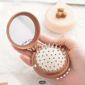 Mini Foldable Hair Brush With Mirror For Women and Girls.