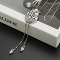 Fashion Unique Hollow Crystal Blue Shampee Tulip Pendant Sweater Necklace Silver Color Chain Long Necklace for Women. 