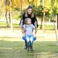 Kids Swing Flying Toy Garden Swing Kids Hanging Seat Toys with Height Adjustable Ropes Indoor Outdoor Toys Rainbow Curved Board.