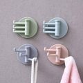 Multifunctional bathroom wall shelf free punching seamless trace rack rotating hook strong 3 branch rotating sticky hook.