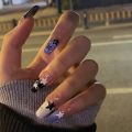 24pcs Purple Nails Long Coffin Sweet Cool Ins Style Nail Art Black Star Design Press On Nail Tips Full Cover Finished Nails.