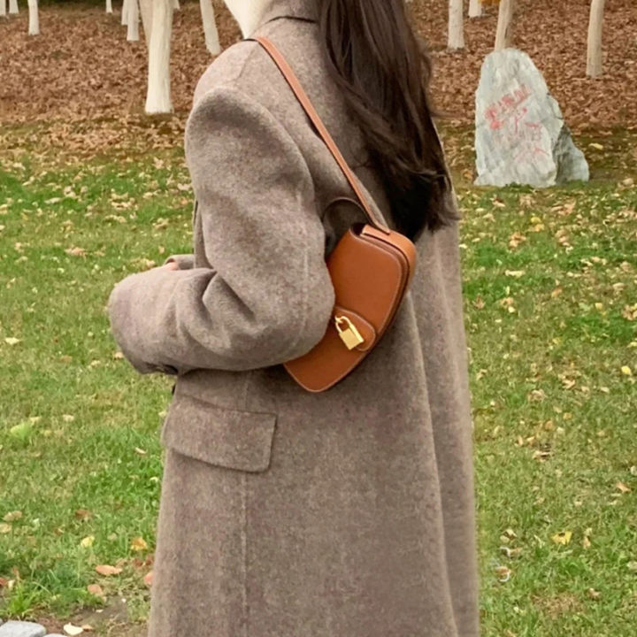 Mini Tabo lock bag triomphe triomphe armpit bag Manhattan one shoulder teensoft kelly bag