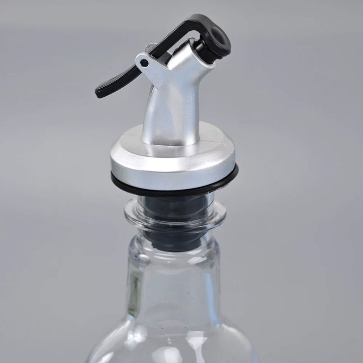 500ml%20Glass%20Oil%20Dispenser%20Bottle%20for%20Kitchen%20Stainless%20Steel%20Leak-Proof%20Cork%20Transparent%20Oil%20Pourer%20and%20Holder%20-%20Image%202