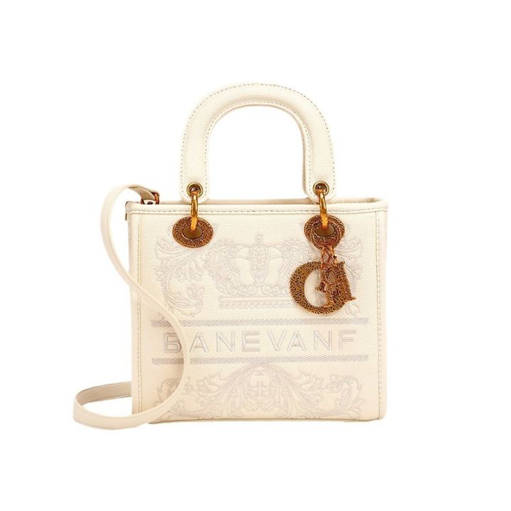 One%20piece%20dropshipping%20wholesale%20daifei%20bag%20women's%202024%20fashion%20lady%20hand-held%20women's%20bag%20diagonal%20across%20niche%20embroidery%20thread%20bright%20leather%20bag%20-%20Image%205