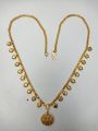 Gold plated locket with chain for women.