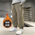 2023 Autumn and Winter Boys' New Fashion Solid Color Thickened Loose Versatile Sports Pants Casual Comfort Versatile Pants. 