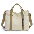 New cross-border women's bag, large capacity canvas handbag, simple casual shoulder bag, fashionable short-distance lightweight travel bag.