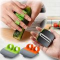 Smart Plastic Stainless Steel Double Finger Palm Peeler Fruit Vegetable Peeler Knife.