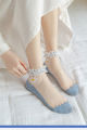 China Yuki Comfortable and cool daisy ice silk transparent socks for women.