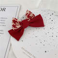 Simple polka dot checkered bow spring clip sweet versatile New Year red accessory Japanese and Korean hair clip at back of the head.
