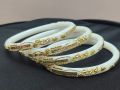 White Shakha Pola Bangles for Women 4 Pcs Plastic. Party , Wedding , Anniversary , Druga Puja & All Time Use Sakha Bangles. Model:CD160.. 