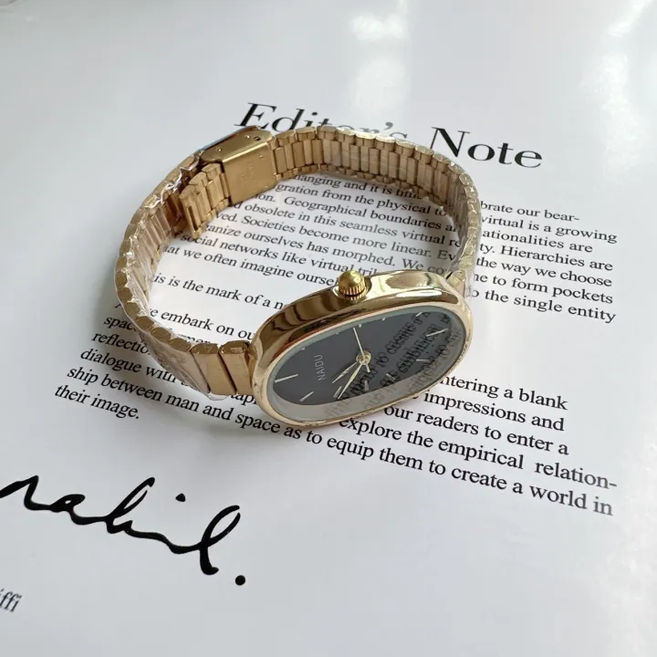 Women%20Quartz%20Watch%20Luxury%20Oval%20Shaped%20Fashion%20Mini%20Case%20Small%20Roman%20Numeral%20Dial%20Female%20Full%20Metal%20Band%20Watches%20Niche%20Wristwatch%20-%20Image%206