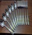 Stainless Steel 6 + 6 Spoon + Fork Set - 12 Pcs Multi Design Silver with Golden Shade. 