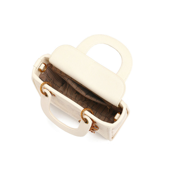 One%20piece%20dropshipping%20wholesale%20daifei%20bag%20women's%202024%20fashion%20lady%20hand-held%20women's%20bag%20diagonal%20across%20niche%20embroidery%20thread%20bright%20leather%20bag%20-%20Image%202