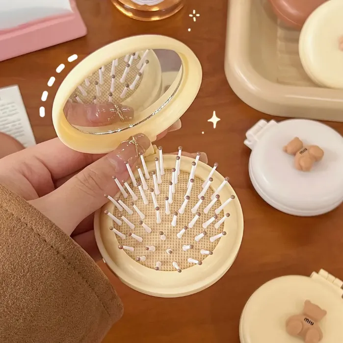 Mini%20Folding%20Hair%20Brush%20for%20Women%20with%20Integrated%20Mirror%20-%20Image%208