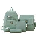 Four-piece set for the beginning of the school season, new simple girls' children's primary and secondary school school bags, large-capacity backpacks, college style backpacks. 