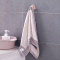Multifunctional bathroom wall shelf free punching seamless trace rack rotating hook strong 3 branch rotating sticky hook. 