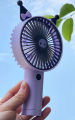 Handheld and Travel-friendly USB Rechargeable Mini Fan with Popular Cartoon Shape.