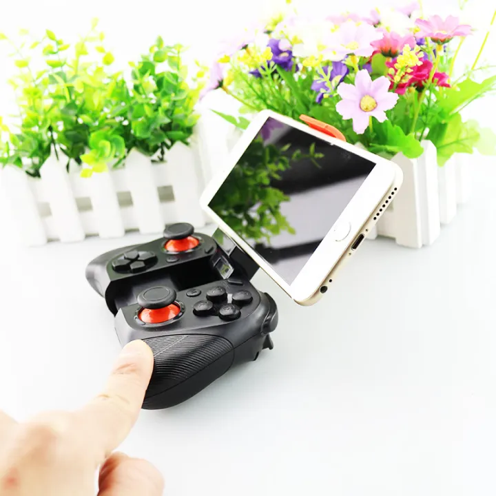 MOCUTE%20050%20VR%20Game%20Pad%20Android%20Joystick%20Controller%20Selfie%20Remote%20Control%20Shutter%20Gamepad%20for%20PC%20Smart%20Phone%20+%20Holder%20-%20Image%204