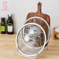 Multifunctional Kitchen Organizer Stainless Steel Pot Lid Holder Cutting Board Storage Rack Modern Kitchen Organizer.
