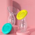 Silicone Manual Breast Milk Collector, Portable Breast Pump Milk Saver with Sealing Lid for Nursing Mothers.