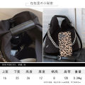 Waterproof nylon cloth bag armpit bag women's 2023 new niche design shoulder bag chain bucket bag cross-body bag. 