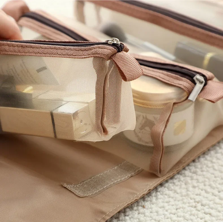 4-in-1%20Foldable%20Travel%20Makeup%20Organizer%20Bag%20with%20Detachable%20Mesh%20Cosmetic%20Pouches%20&%20Hanging%20Hook%20%E2%80%93%20Portable%20Roll-Up%20Toiletry%20Storage%20Case%20for%20Cosmetics,%20Skincare%20&%20Toiletries%20%E2%80%93%2053%C3%9722.5cm%20-%20Image%202