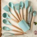 "Multicolor Silicone Kitchen Utensils Set, 12-Piece – Wooden Handles – Non-Stick Spatula, Shovel, Spoon – Ideal for Cooking and Serving – With Storage Bucket and PP Handle". 