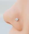 Gold Plated Flexible Nose Pin with 7 AD Zirconia Stones Elegant Stylish Design for All Sizes Durable Fashion Accessory with White Stones. 