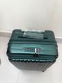 Elegant Forest Green Hard-Shell Spinner Suitcase - Lightweight ABS Carry-On Luggage with Ribbed Finish and Telescopic Handle. 