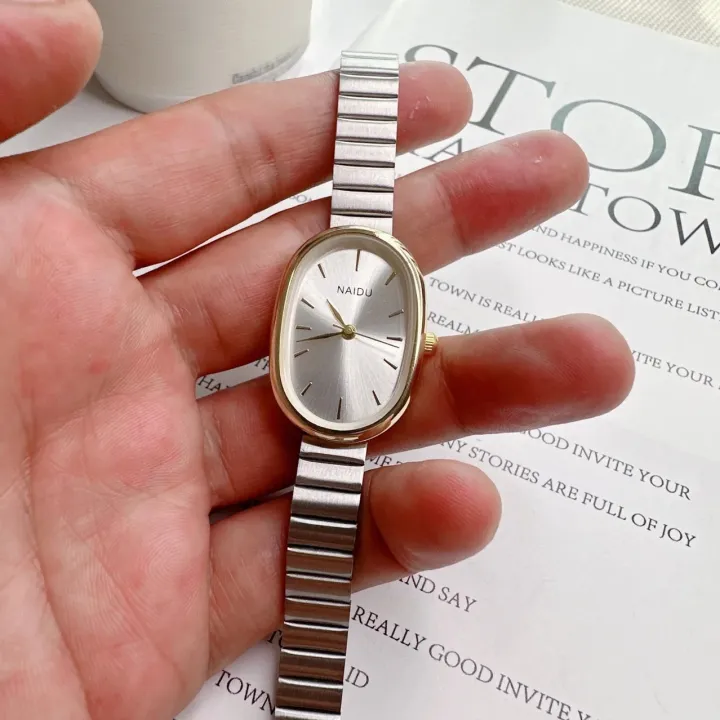 Women%20Quartz%20Watch%20Luxury%20Oval%20Shaped%20Fashion%20Mini%20Case%20Small%20Roman%20Numeral%20Dial%20Female%20Full%20Metal%20Band%20Watches%20Niche%20Wristwatch%20-%20Image%203
