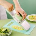 Multi-functional Vegetable Slicer & Cutter (5 Blades). 