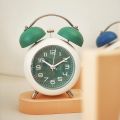 4-Inch Twin Bell Alarm Clock Metal Frame Silent Non-Ticking Quartz Table Clock Round Home Decor Pointer Clocks with Backlight. 