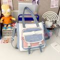 Large capacity contrasting tote bag for school girls in class bag handbag crossbody bag for junior high school students. 