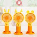 Rechargeable Stylish Cartoon Shape Mini Turbo Fan With Mobile Holder For Indoor & Outdoor Use -  Multicolor. 