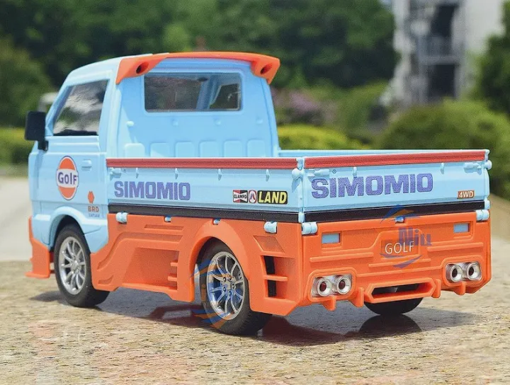 Suzuki%20Carry%20Pickup%20Truck%201:24%20Alloy%20Diecast%20Model%20%E2%80%93%20Modified%20Design,%20Sound%20&%20Light,%20Pull-Back%20Toy%20for%20Kids%20Gift%20-%20Image%204