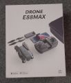 E88MAX Rc Drone Brushless Motor Professional 4K Wide Angle HD Camera Height Fixed Remote Control Foldable Quadrotor Helicopter.