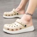 Summer New Coros Shoes Men's Big Toe Slippers Thick Bottom Leisure Pump Sandals Bird's Nest Non-Slip Sandals. 