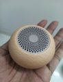 Wood bluetooth mini speaker round shape. 