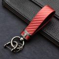 Automotive carbon fiber pattern fashion long metal key chain automotive leather key chain spring ring horseshoe buckle. 
