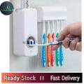 Toothpaste Dispenser Plus Toothbrush Holder. 